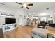Open-concept living room flows into the kitchen and dining area, perfect for entertaining at 4412 Reding Way, Lakeland, FL 33813