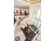 Elegant foyer with a chandelier, marble floors, a staircase, and an open floor plan at 460 Canterwood Dr, Mulberry, FL 33860