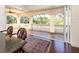 Screened-in patio with decorative railing and tile flooring perfect for enjoying the outdoors in comfort at 460 Canterwood Dr, Mulberry, FL 33860