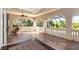 Spacious patio with decorative railing, ceiling fan, and seating area offering a serene outdoor retreat at 460 Canterwood Dr, Mulberry, FL 33860