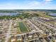 Residential area featuring a community lake, and nearby amenities at 4886 St James Ln, Winter Haven, FL 33881