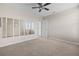 Spacious bedroom featuring a ceiling fan and ample natural light at 4886 St James Ln, Winter Haven, FL 33881