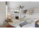 Spacious living area with fireplace, tv, a comfortable seating arrangement, and a staircase at 4886 St James Ln, Winter Haven, FL 33881