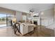 Comfortable living room with a fireplace, ceiling fan, and sliding glass doors at 4886 St James Ln, Winter Haven, FL 33881