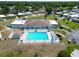 Aerial view of community center with a pool and other recreational amenities at 5015 Fox Cliff Dr, Lakeland, FL 33810