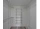 Walk-in closet features wire shelving for optimal storage and organization at 5015 Fox Cliff Dr, Lakeland, FL 33810