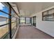 Enclosed patio with outdoor carpet and scenic views with ample natural light at 5015 Fox Cliff Dr, Lakeland, FL 33810