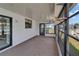 Screened-in patio with outdoor carpeting and a view of the surrounding landscape at 5015 Fox Cliff Dr, Lakeland, FL 33810