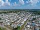 Expansive aerial view showcases the density and layout of the mobile home community at 5016 Forest Crest Dr, Lakeland, FL 33810