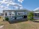 Charming single-story home with lovely exterior and manicured lawn at 5016 Forest Crest Dr, Lakeland, FL 33810