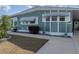 Close up of exterior showing number of home with updated windows and manicured lawn at 5016 Forest Crest Dr, Lakeland, FL 33810