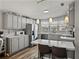 Bright kitchen with stainless steel appliances, ample counter space, and modern pendant lighting at 5016 Forest Crest Dr, Lakeland, FL 33810
