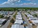 Aerial view shows a quiet residential neighborhood with well-maintained homes and tree-lined streets at 5016 Forest Crest Dr, Lakeland, FL 33810