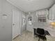 Efficient home office with desk, chair, and natural light from the window at 5016 Forest Crest Dr, Lakeland, FL 33810