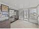 Inviting sunroom with large windows and sliding glass door, providing ample natural light at 5016 Forest Crest Dr, Lakeland, FL 33810