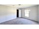 Bedroom features a plush carpet and closet at 5248 Rock Dove Trl, Lakeland, FL 33810