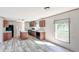 Open kitchen featuring an island, modern appliances, and ample counter space at 5248 Rock Dove Trl, Lakeland, FL 33810