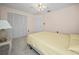 Bedroom featuring carpet, closet, ceiling fan and neutral paint at 537 Eagle Run, Lakeland, FL 33809