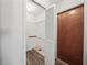 Walk-in closet featuring a wire shelving and a wooden floor at 537 Eagle Run, Lakeland, FL 33809