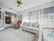 Bright Florida Room with ceiling fan, neutral carpet, and a view to other rooms at 537 Eagle Run, Lakeland, FL 33809