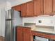 Convenient kitchen area with modern stainless steel appliances and ample cabinet storage space at 537 Eagle Run, Lakeland, FL 33809