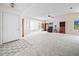 Spacious living room with high ceilings, neutral paint, and abundant natural light throughout at 537 Eagle Run, Lakeland, FL 33809