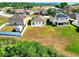 Bird's eye view of a home's backyard featuring lush grass and a fence at 5793 Dornich Dr, Auburndale, FL 33823