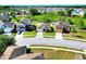 Aerial view of a residential neighborhood on a sunny day at 5793 Dornich Dr, Auburndale, FL 33823