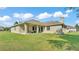 Large backyard with covered patio perfect for entertaining guests at 6372 English Creek Dr, Lakeland, FL 33811