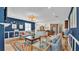 Inviting living room with comfortable seating and open flow to the kitchen at 6372 English Creek Dr, Lakeland, FL 33811