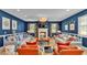 Bright, colorful living room with fireplace and modern furnishings at 6372 English Creek Dr, Lakeland, FL 33811