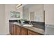 Large main bathroom with double sinks, granite countertops, and great lighting at 6372 English Creek Dr, Lakeland, FL 33811