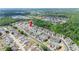 An aerial view showcasing the neighborhood, its layout, and surrounding green spaces at 6506 Sedgeford Dr, Lakeland, FL 33811
