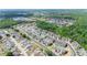 An aerial view showcasing the neighborhood, its layout, and surrounding green spaces at 6506 Sedgeford Dr, Lakeland, FL 33811
