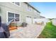 Backyard featuring a paved patio with outdoor seating and a fenced yard at 6506 Sedgeford Dr, Lakeland, FL 33811