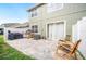 Backyard with a paved patio and outdoor seating, partially fenced at 6506 Sedgeford Dr, Lakeland, FL 33811