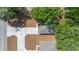 Overhead aerial view of the home featuring a large driveway and mature trees at 6625 Thornhill Rd, Winter Haven, FL 33880