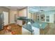 Kitchen features granite countertops, stainless steel appliances, and hardwood floors, perfect for cooking and entertaining at 6626 Royal Forest Dr, Lakeland, FL 33811