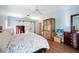 Bedroom with sliding barn doors to the bathroom at 6911 Wildberry Ln, Lakeland, FL 33813
