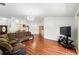 Living area featuring hardwood flooring and lots of open space at 7139 Cedarcrest Blvd, Lakeland, FL 33810