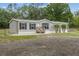 Charming single-story home with well-maintained landscaping and a spacious yard at 7202 Glen Meadow Dr, Lakeland, FL 33810