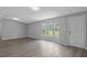 Bright living room with ample natural light from the large windows at 7202 Glen Meadow Dr, Lakeland, FL 33810