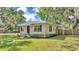Inviting single-story home with a well-maintained lawn and tasteful exterior accents at 747 E Bella Vista St, Lakeland, FL 33805