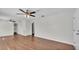 Spacious living room with wood-look flooring and neutral walls, offering a versatile living space at 747 E Bella Vista St, Lakeland, FL 33805