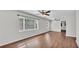 Bright and open living room featuring wood-look flooring and plenty of natural light at 747 E Bella Vista St, Lakeland, FL 33805