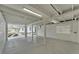 Large unfinished basement offers a clean and expansive space with exposed beams and concrete flooring at 828 E Valencia St, Lakeland, FL 33805