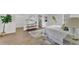Spacious bedroom featuring wood-look floors and bright natural light at 828 E Valencia St, Lakeland, FL 33805