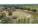 Expansive parcel featuring open land with trees and a cleared area, offering a serene, rural setting at 8337 Fussell Rd, Polk City, FL 33868