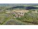 Overview of land featuring a mix of open spaces, clusters of trees, and natural growth, creating a serene landscape at 8337 Fussell Rd, Polk City, FL 33868