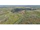 Verdant acreage with mixed trees and wetland areas creating a natural habitat and providing seclusion at 8337 Fussell Rd, Polk City, FL 33868